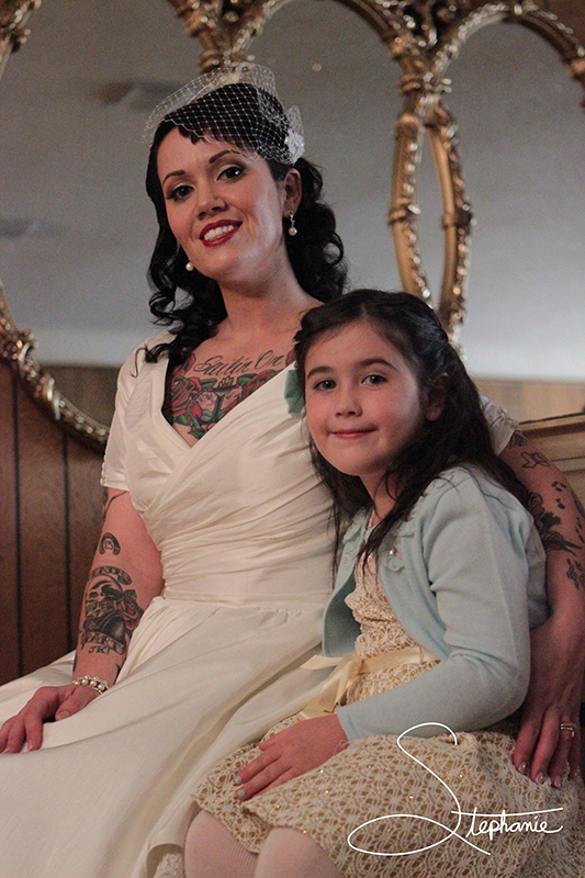 Photo of a mother and daughter right before a wedding.